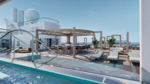 Render del Vibe Beach Club: piscina junto a bar circular con pérgola, tumbonas y vista al mar en cubierta de crucero