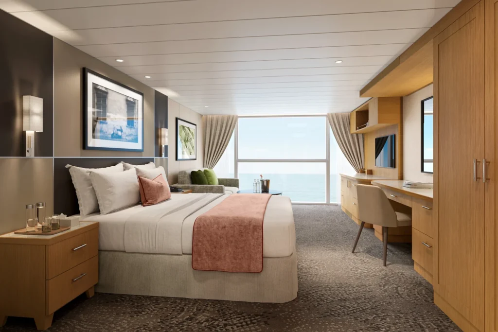 Interior de la nueva Deluxe Panoramic Ocean View Suite con diseño tecnológico y ventanal panorámico